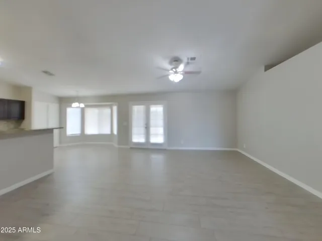 a picture of a bathroom with a shower and a mirror