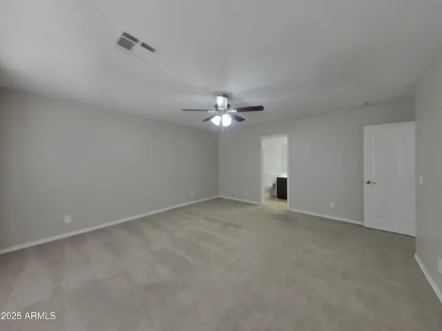 a bathroom with a sink a mirror and a shower