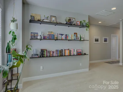 a bedroom with a bed and a desk