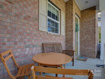 a kitchen with stainless steel appliances kitchen island granite countertop a stove a sink and a microwave