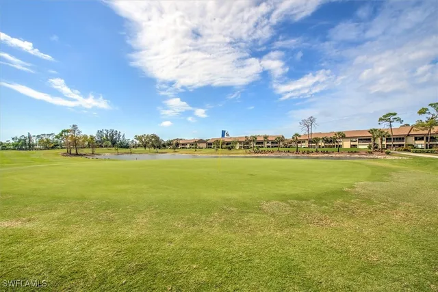 a view of a house with a big yard