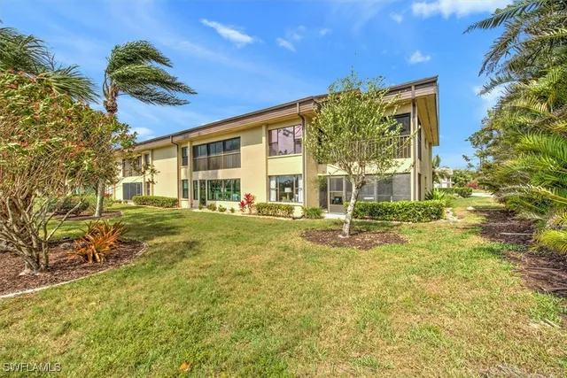 a view of a house with outdoor space and porch