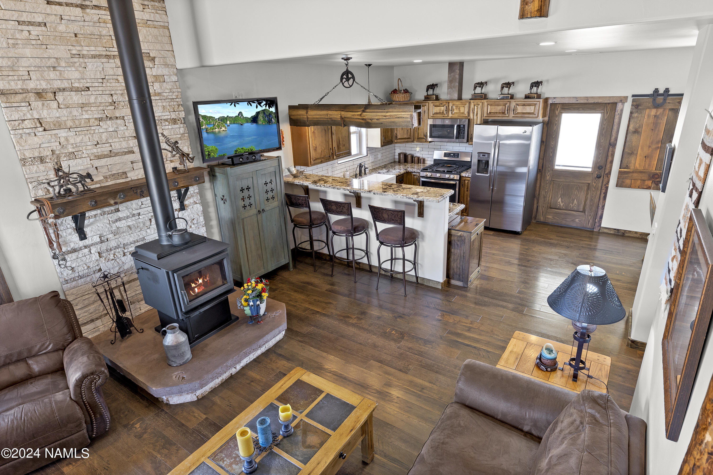 5268 Pabst Way Flagstaff, AZ 86004 - Photo 35 of 55 Texas limestone behind wood stove