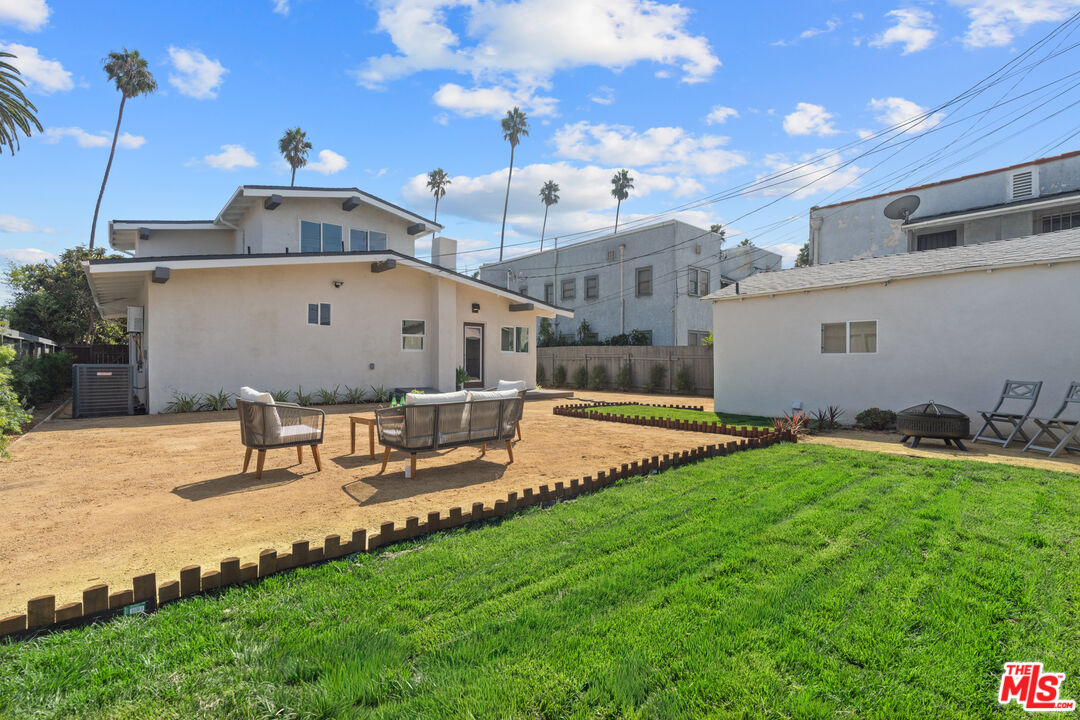 2209 West Boulevard Los Angeles, CA 90016 - Photo 23 of 29 a view of a house with a yard