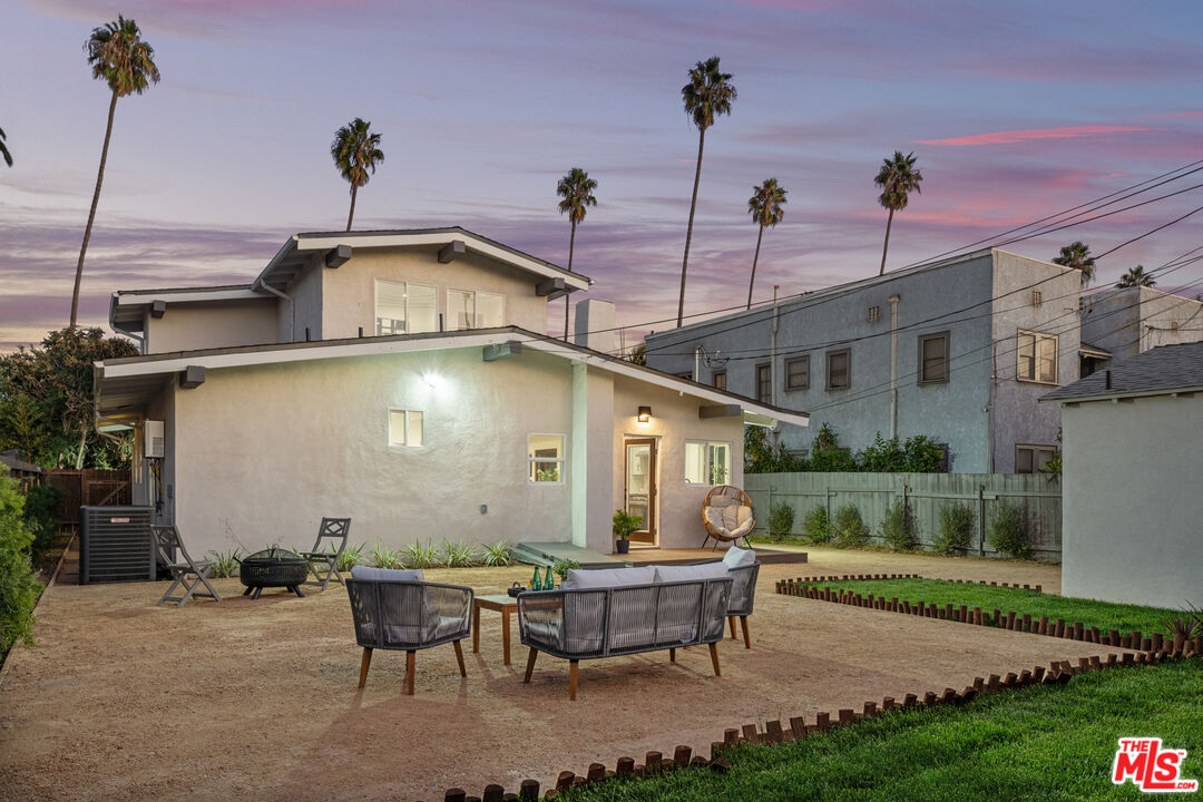 2209 West Boulevard Los Angeles, CA 90016 - Photo 26 of 29 a view of a house with backyard and sitting area