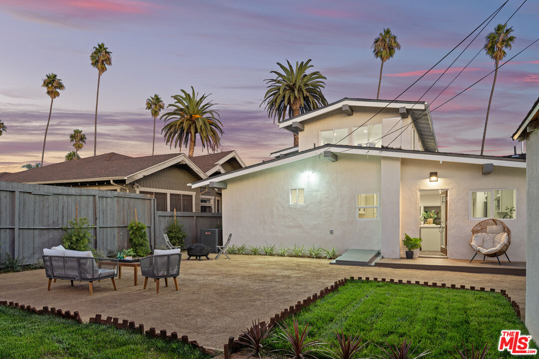 2209 West Boulevard Los Angeles, CA 90016 - Photo 28 of 29 a view of a chair and table in backyard