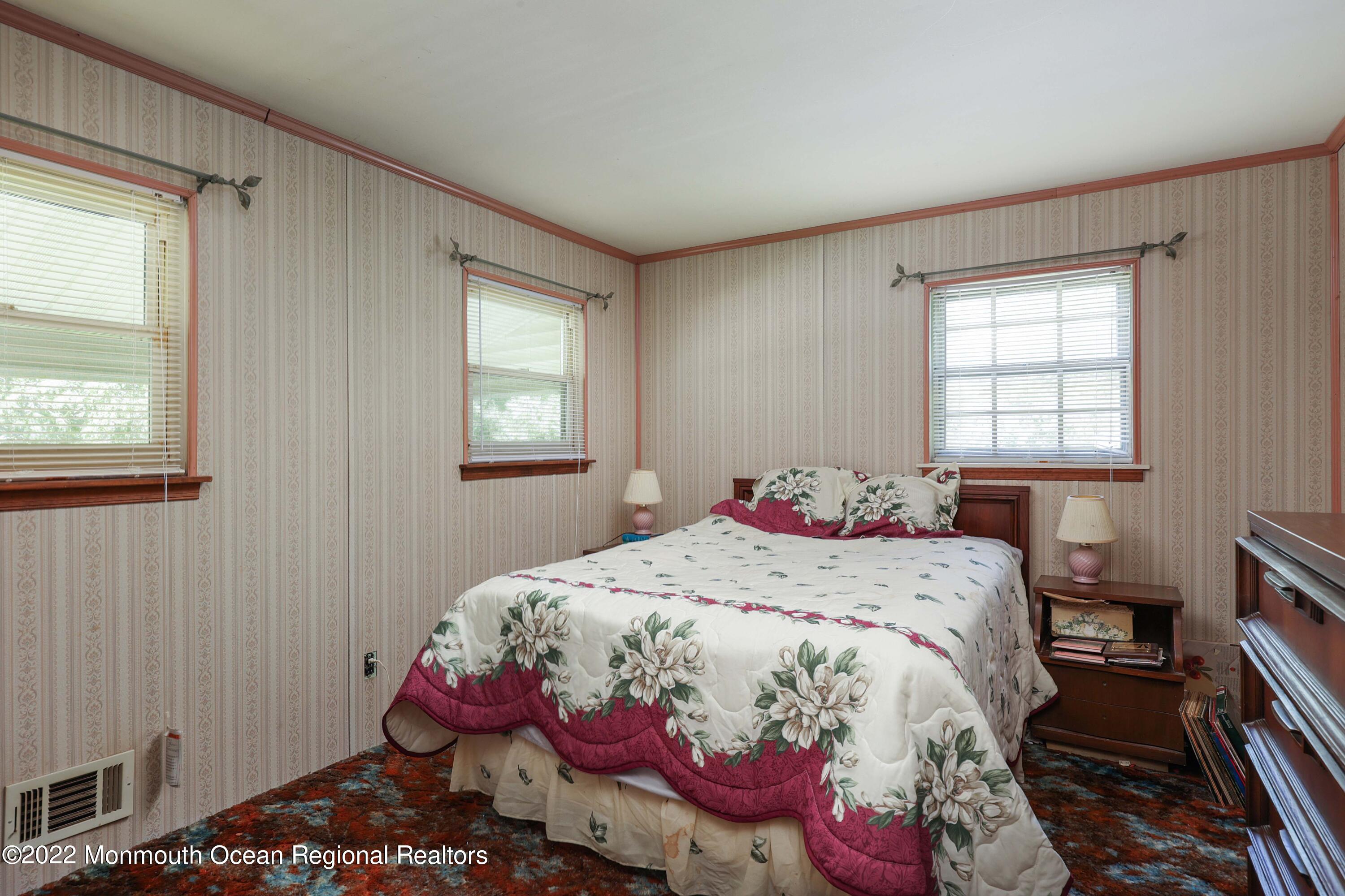 53 Valley Road Jackson, NJ 08527 - Photo 1 of 11 a bedroom with a bed and a window