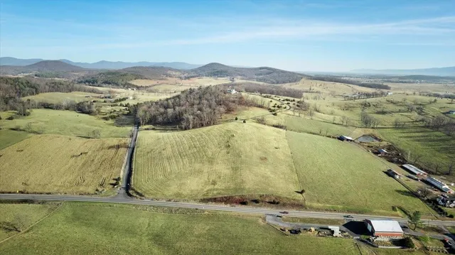 an aerial view of residential house with pool