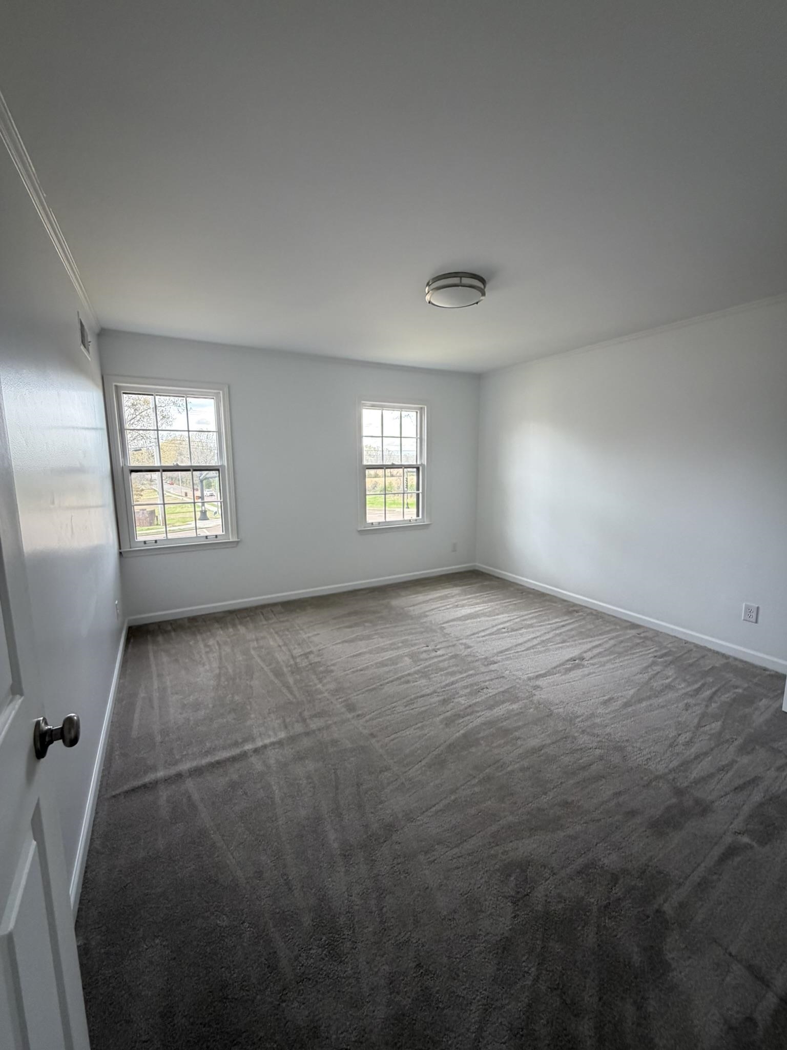 2960 South Germantown Road Germantown, TN 38138 - Photo 28 of 36 an empty room with windows