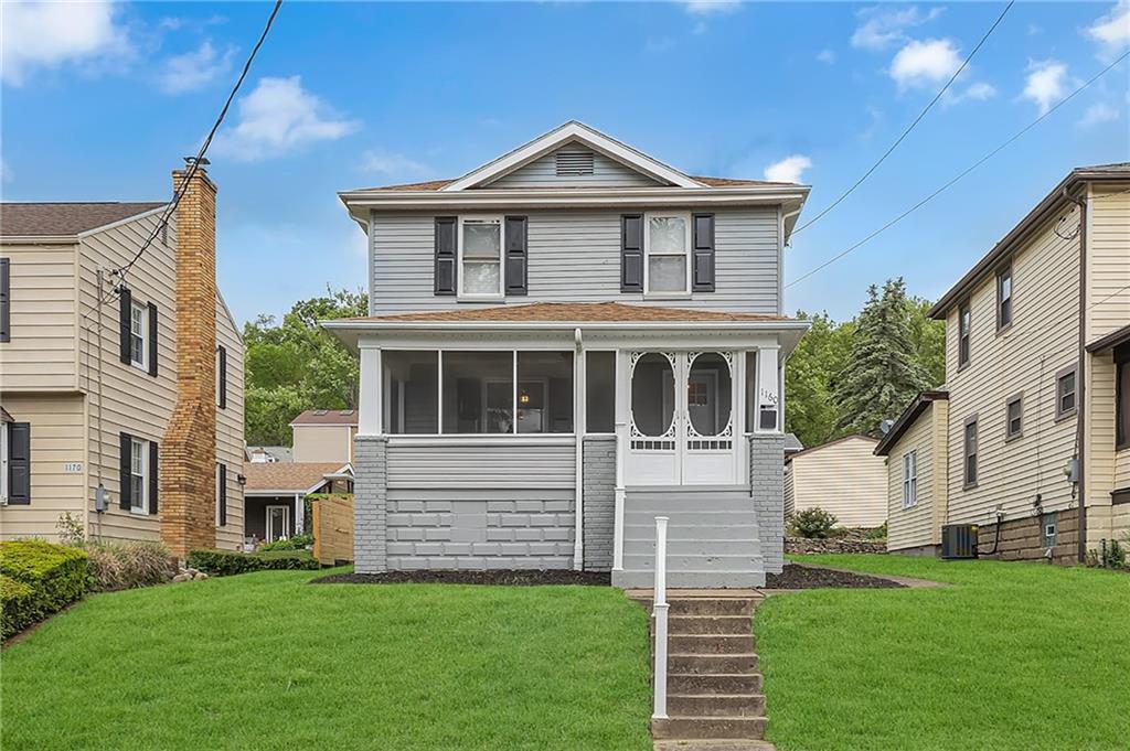 1160 6th Street Beaver, PA 15009 - Photo 1 of 31 a front view of a house with a yard