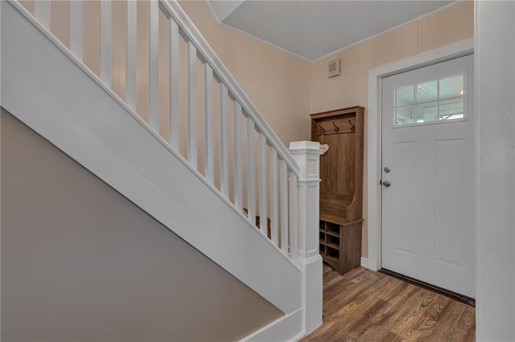 1160 6th Street Beaver, PA 15009 - Photo 13 of 31 a view of staircase with railing and white walls