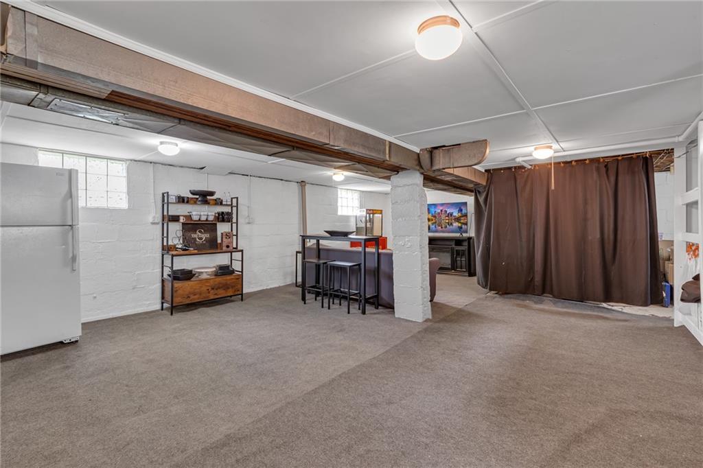 1160 6th Street Beaver, PA 15009 - Photo 22 of 31 a view of a room with furniture and a ceiling fan
