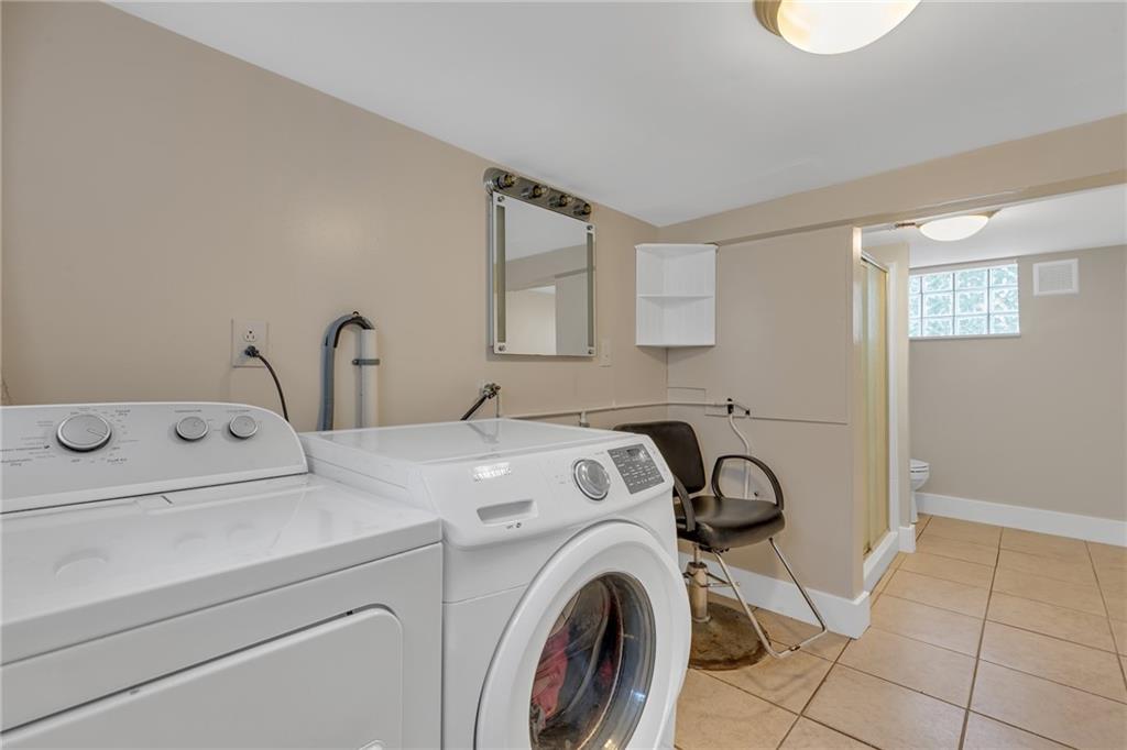 1160 6th Street Beaver, PA 15009 - Photo 23 of 31 a utility room with dryer and washer