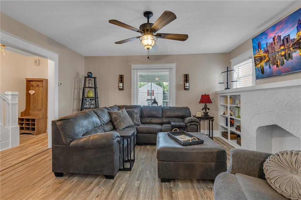 1160 6th Street Beaver, PA 15009 - Photo 5 of 31 a living room with furniture and a fireplace