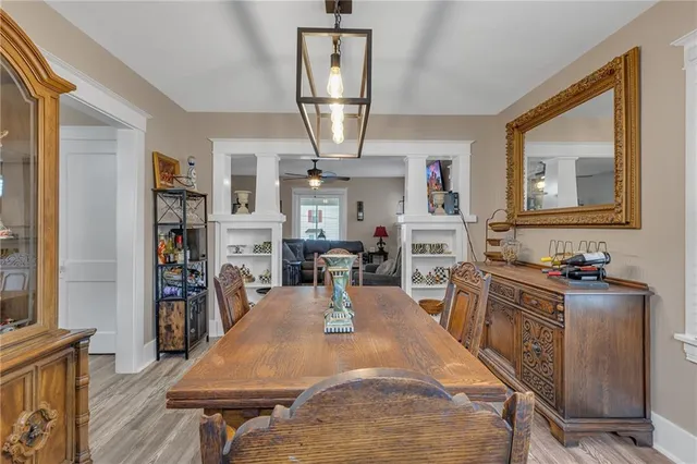 a view of a kitchen and dining room