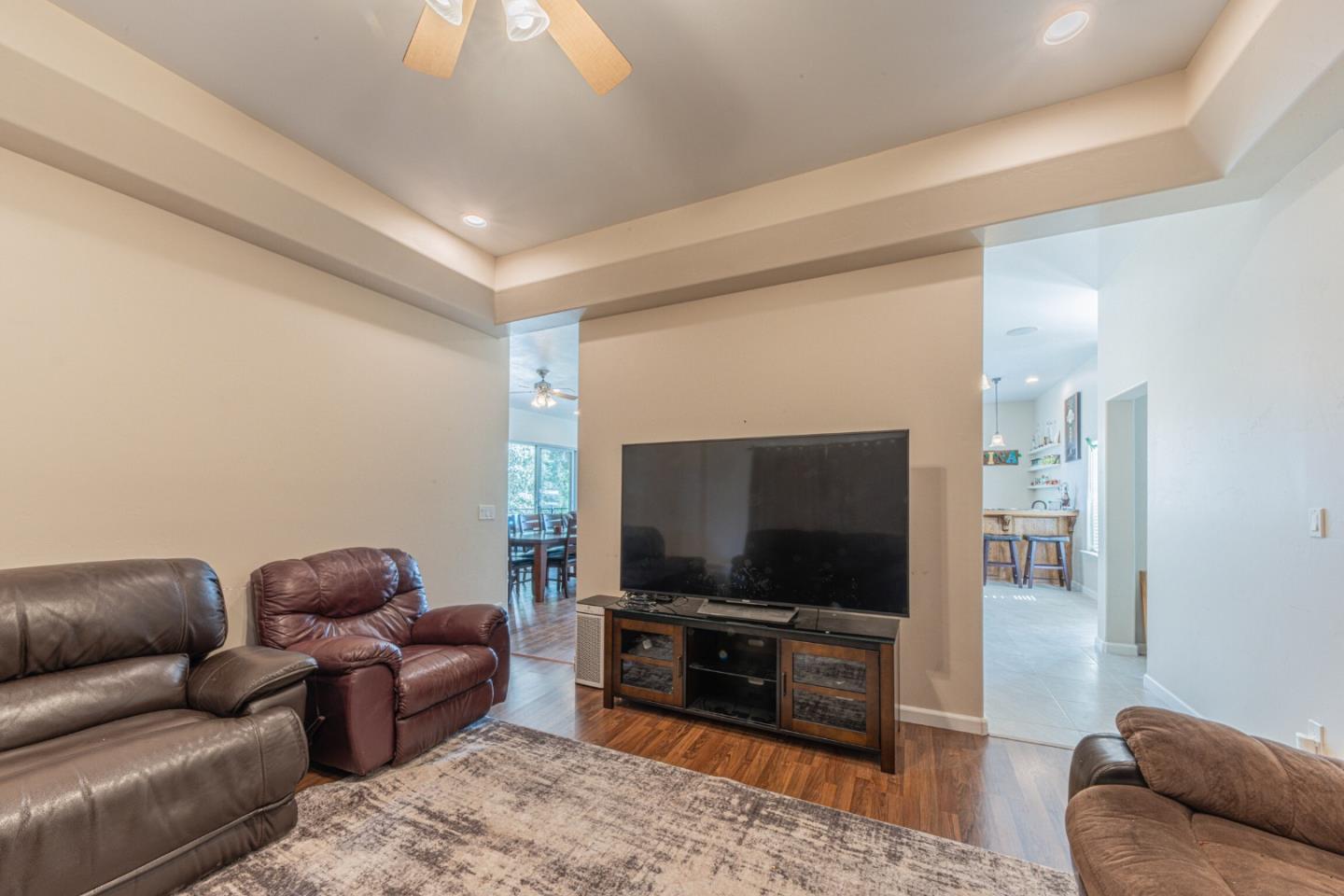 2188 Ridge Rider Road Bradley, CA 93426 - Photo 25 of 47 a living room with furniture and a flat screen tv