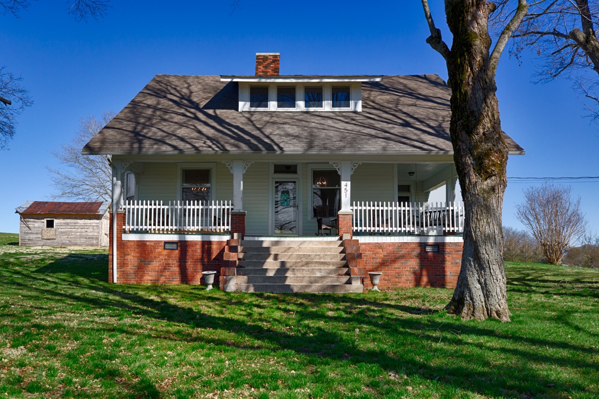 451 Wheelerton Road Dellrose, TN 38453 - Photo 1 of 34 a front view of house with yard and outdoor seating