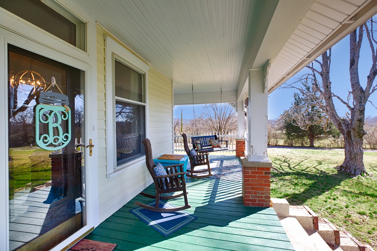 451 Wheelerton Road Dellrose, TN 38453 - Photo 3 of 34 a outdoor space with patio the couches and a dining table with the garden view