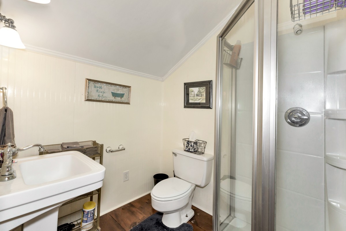 451 Wheelerton Road Dellrose, TN 38453 - Photo 22 of 34 a bathroom with a toilet and a sink