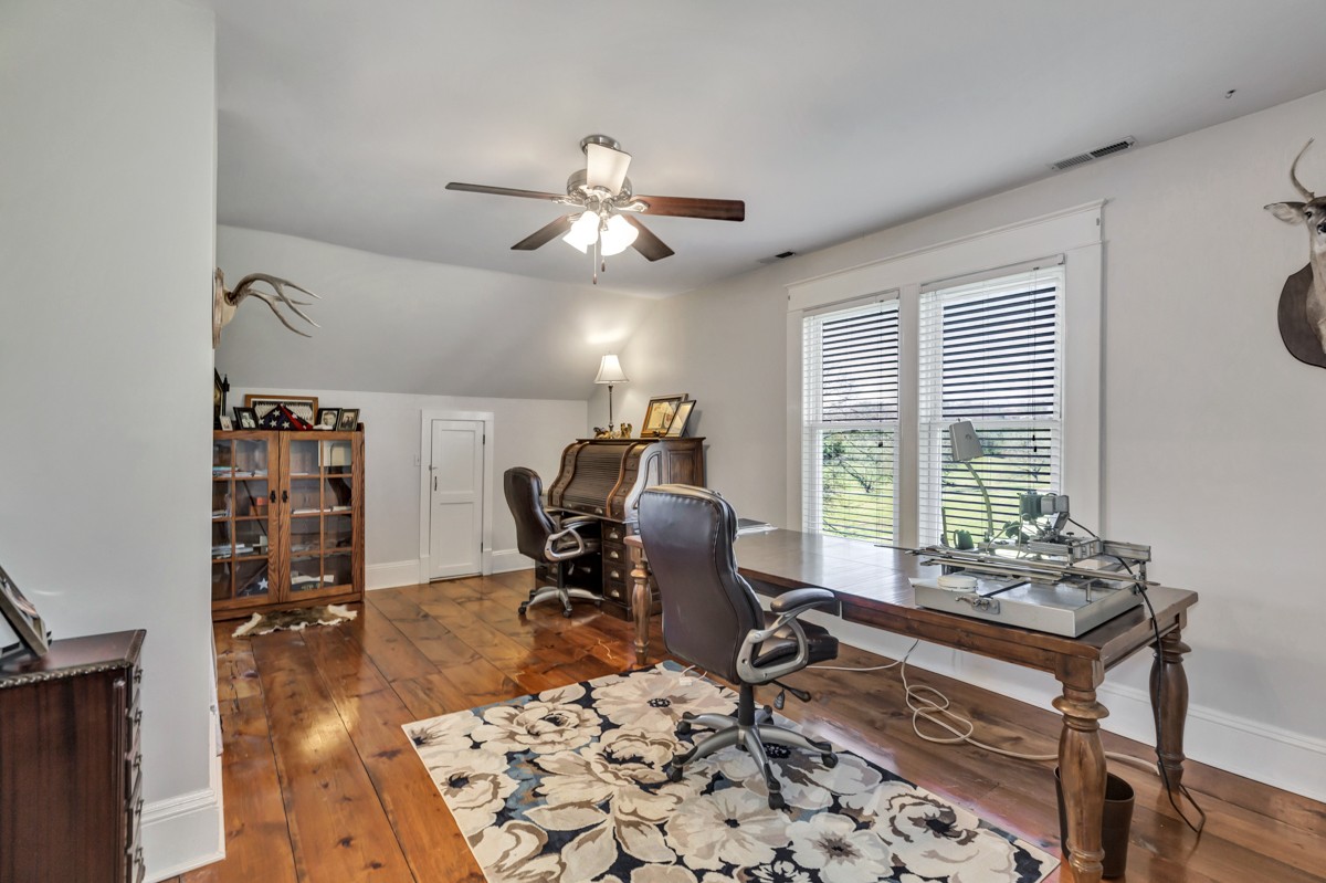 451 Wheelerton Road Dellrose, TN 38453 - Photo 24 of 34 a view of a workspace with furniture and a window