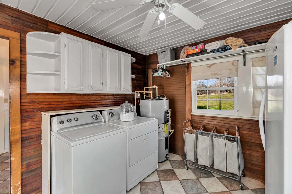 451 Wheelerton Road Dellrose, TN 38453 - Photo 26 of 34 a utility room with dryer and washer