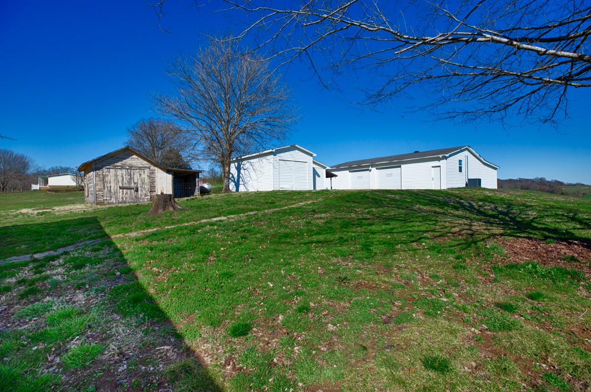 451 Wheelerton Road Dellrose, TN 38453 - Photo 30 of 34 a house view with a garden space