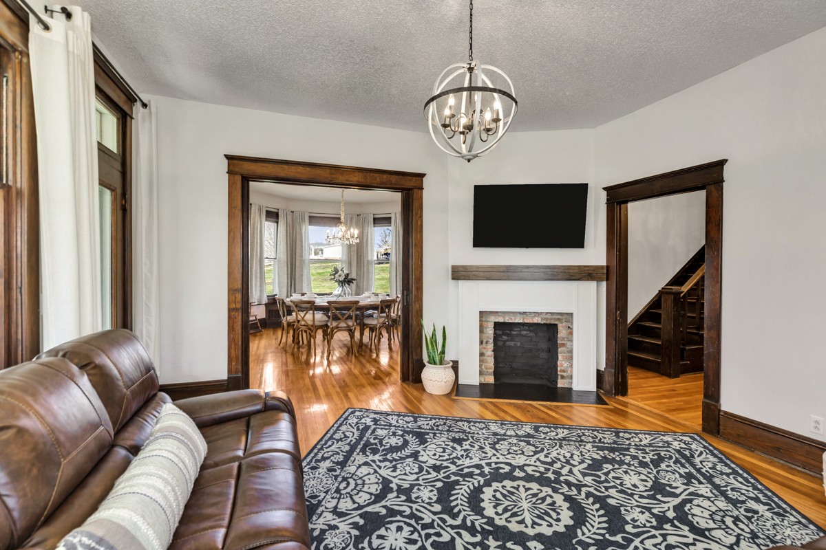 451 Wheelerton Road Dellrose, TN 38453 - Photo 7 of 34 a living room with furniture and a fireplace