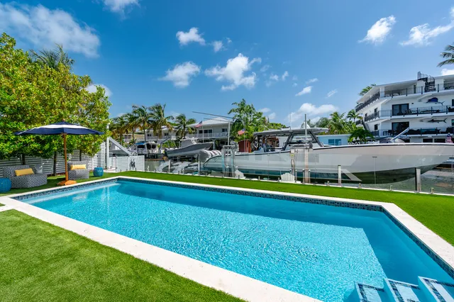 a view of a porch and garden