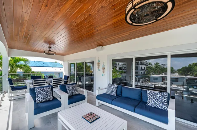 a bathroom with a bathtub shower sink and mirror