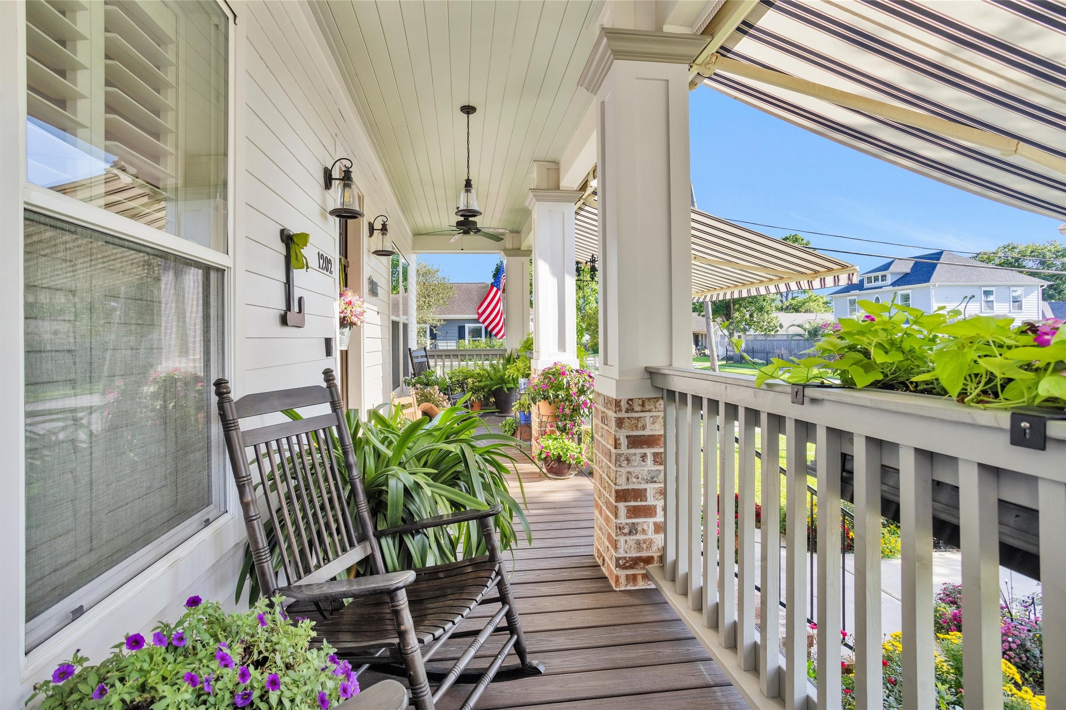 1202 Walton Street Houston, TX 77009 - Photo 3 of 32 Charming Covered Front Porch Overlooking Beautiful Landscaping—The Perfect Place to Enjoy Morning Coffee, Evening Conversations, and the Beauty of the Outdoors.