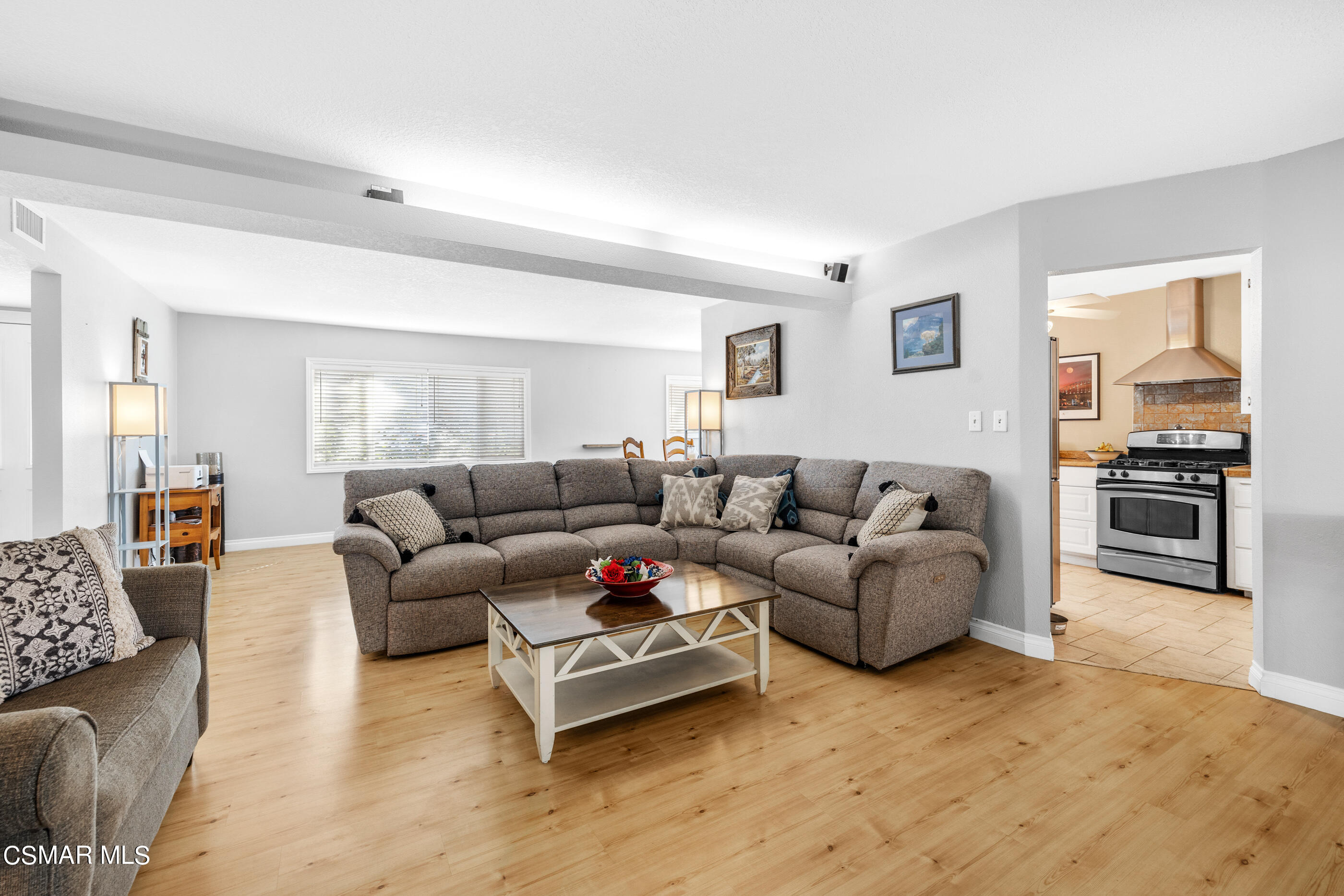 3283 Austin Avenue Simi Valley, CA 93063 - Photo 3 of 30 a living room with furniture and wooden floor