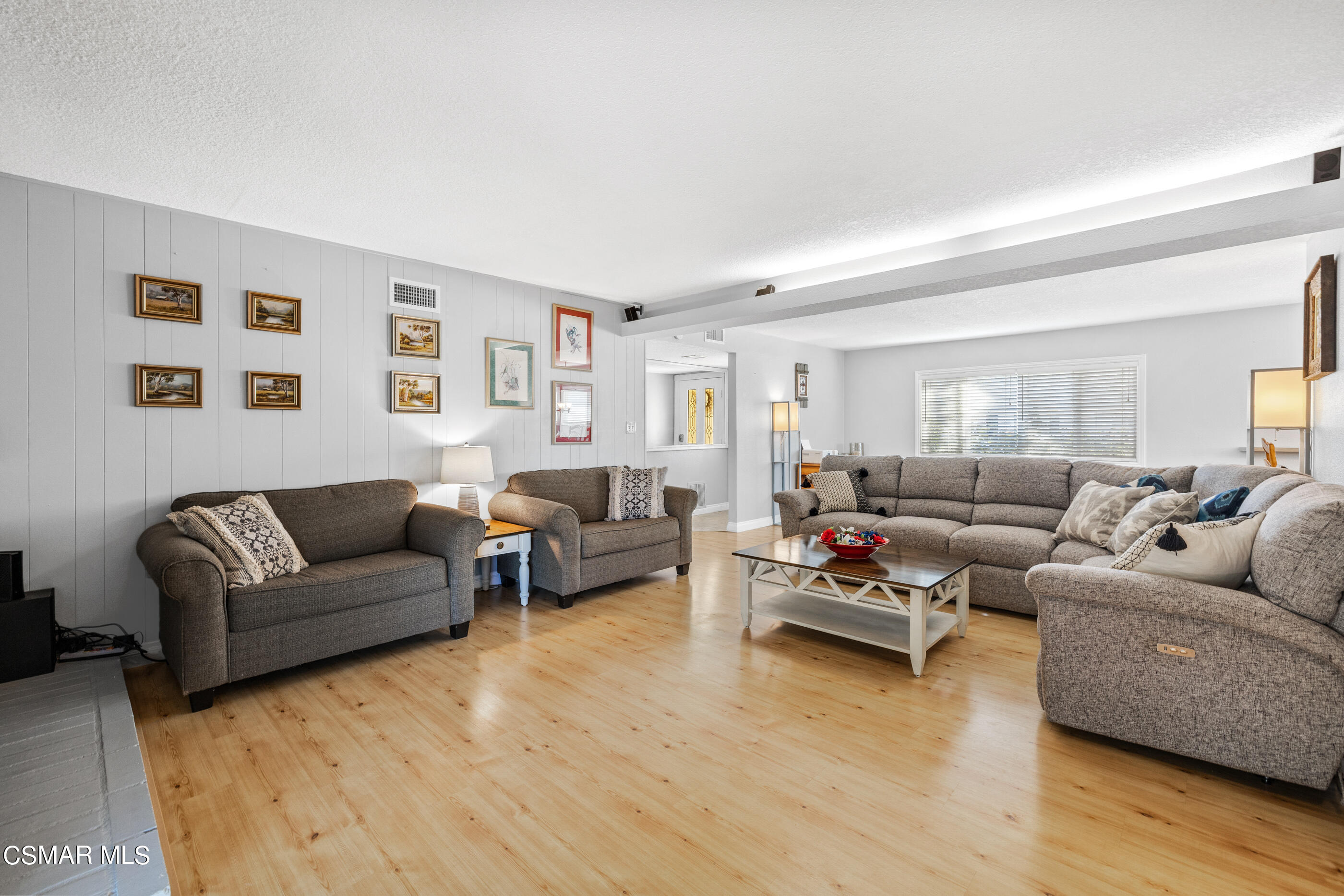 3283 Austin Avenue Simi Valley, CA 93063 - Photo 9 of 30 a living room with furniture and a wooden floor