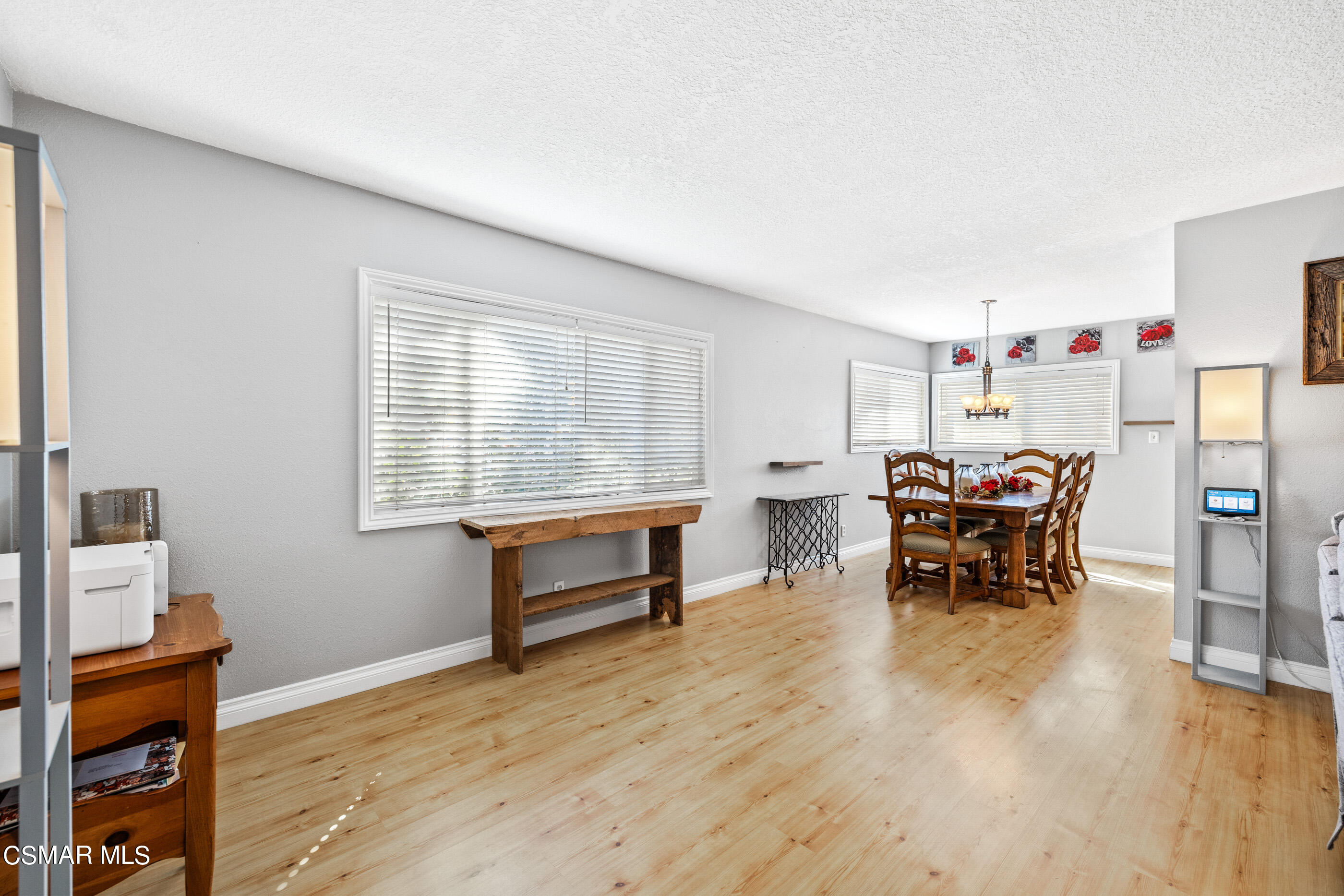 3283 Austin Avenue Simi Valley, CA 93063 - Photo 10 of 30 a living room with furniture and a wooden floor