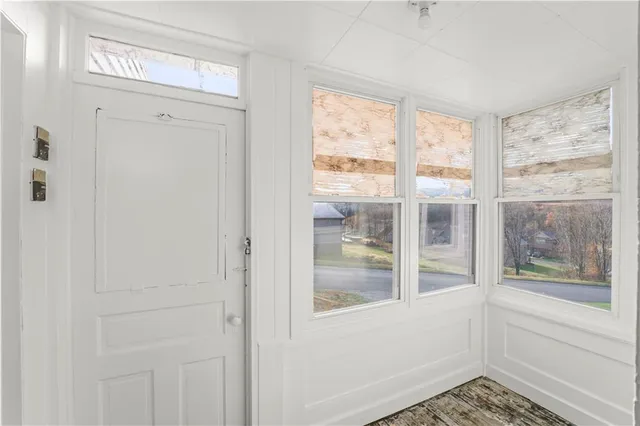 a view of a room that has a window in it