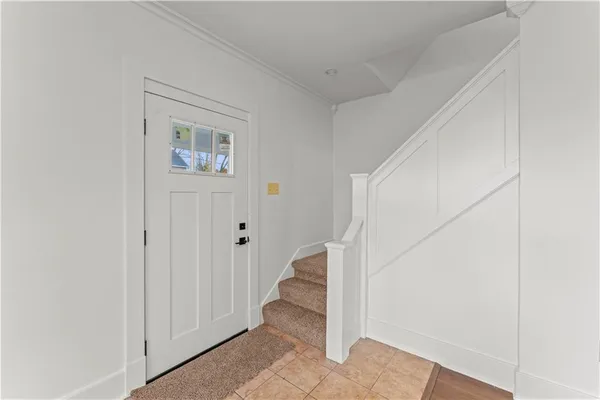a view of a hallway with staircase