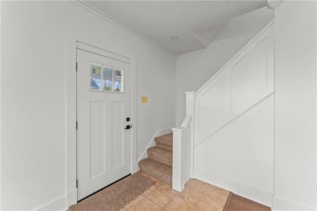 a view of a hallway with staircase