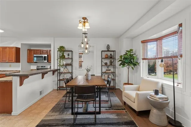 a living room with furniture and a table