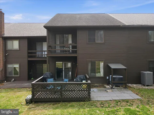 a view of house with yard