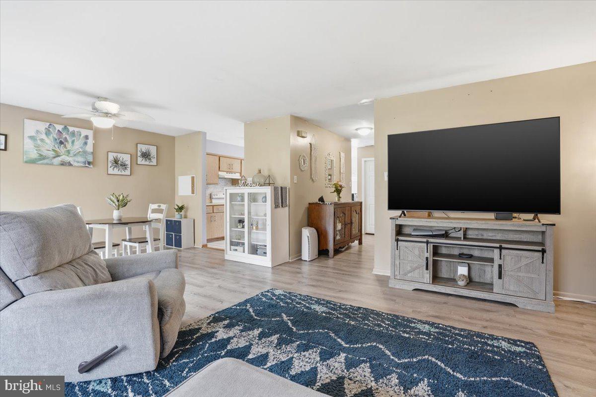 702 Village Road Orwigsburg, PA 17961 - Photo 3 of 27 a living room with furniture and a flat screen tv