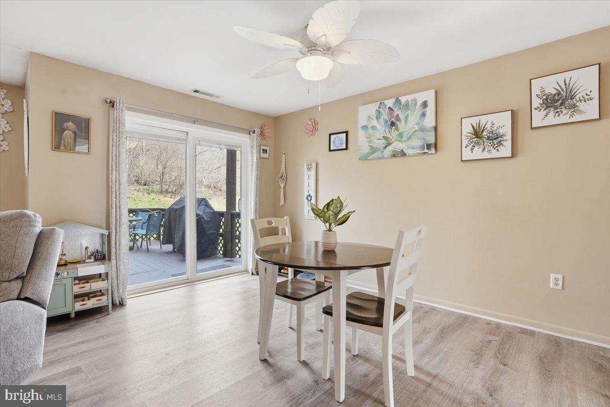 702 Village Road Orwigsburg, PA 17961 - Photo 5 of 27 a dining room with furniture and window