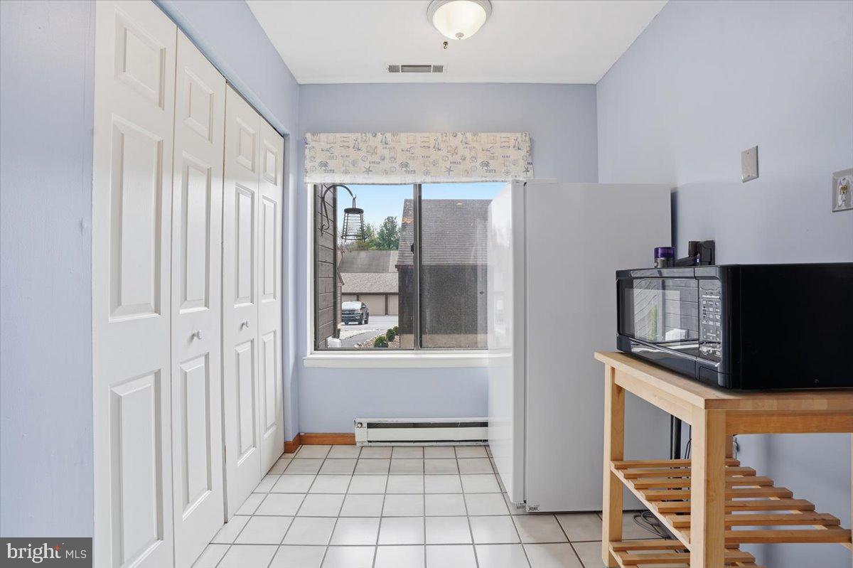 702 Village Road Orwigsburg, PA 17961 - Photo 10 of 27 a view of an entryway with wooden floor