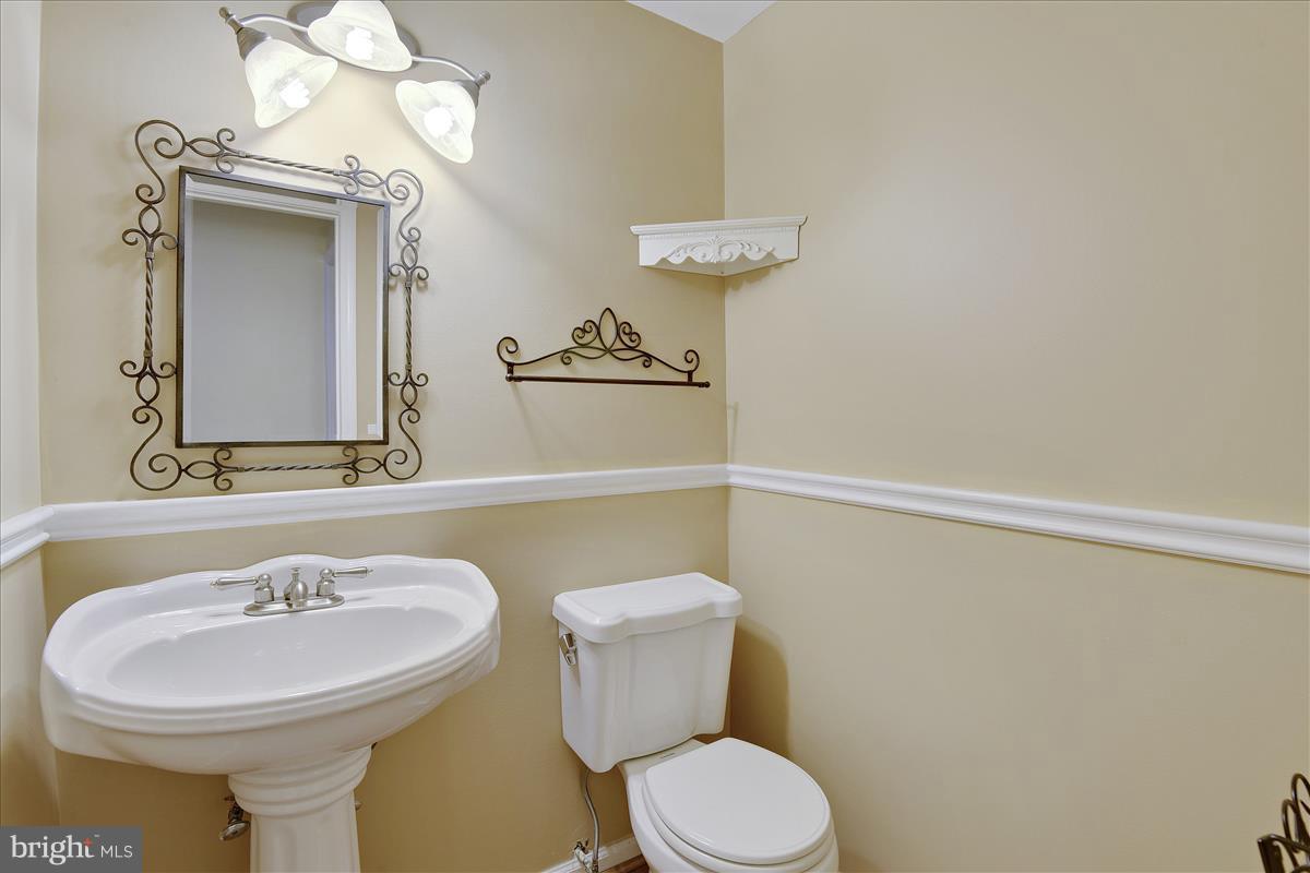 8448 Springfield Oaks Drive Springfield, VA 22153 - Photo 24 of 28 Powder room on lower level