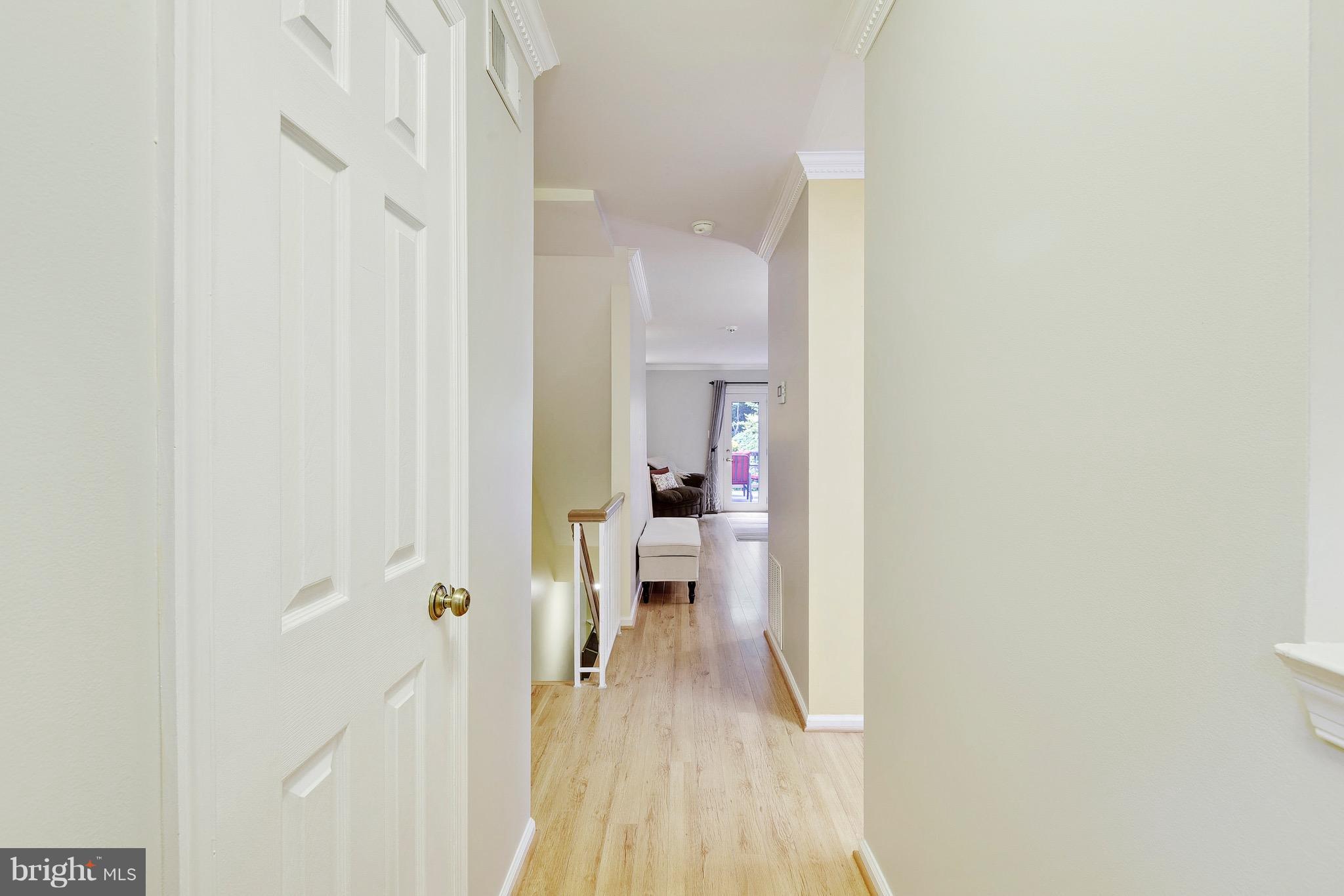 8448 Springfield Oaks Drive Springfield, VA 22153 - Photo 9 of 28 View from front door with powder room on the left