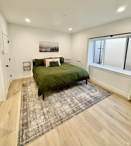 70 East Hwy 153, Unit A4 Beaver, UT 84713 - Photo 8 of 19 Bedroom with light wood-style flooring and recessed lighting