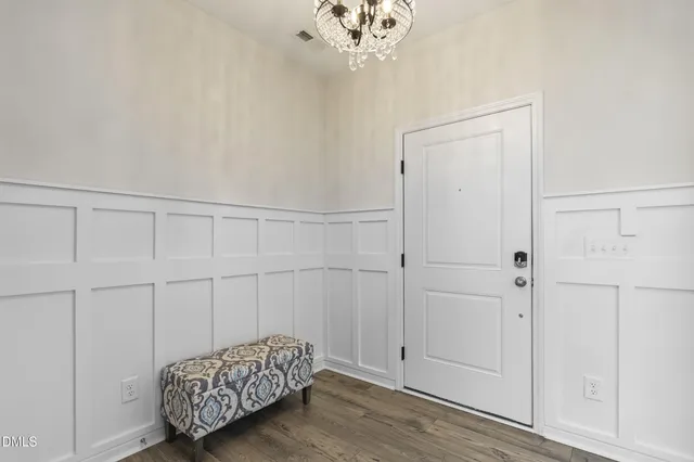 a room with furniture and a chandelier