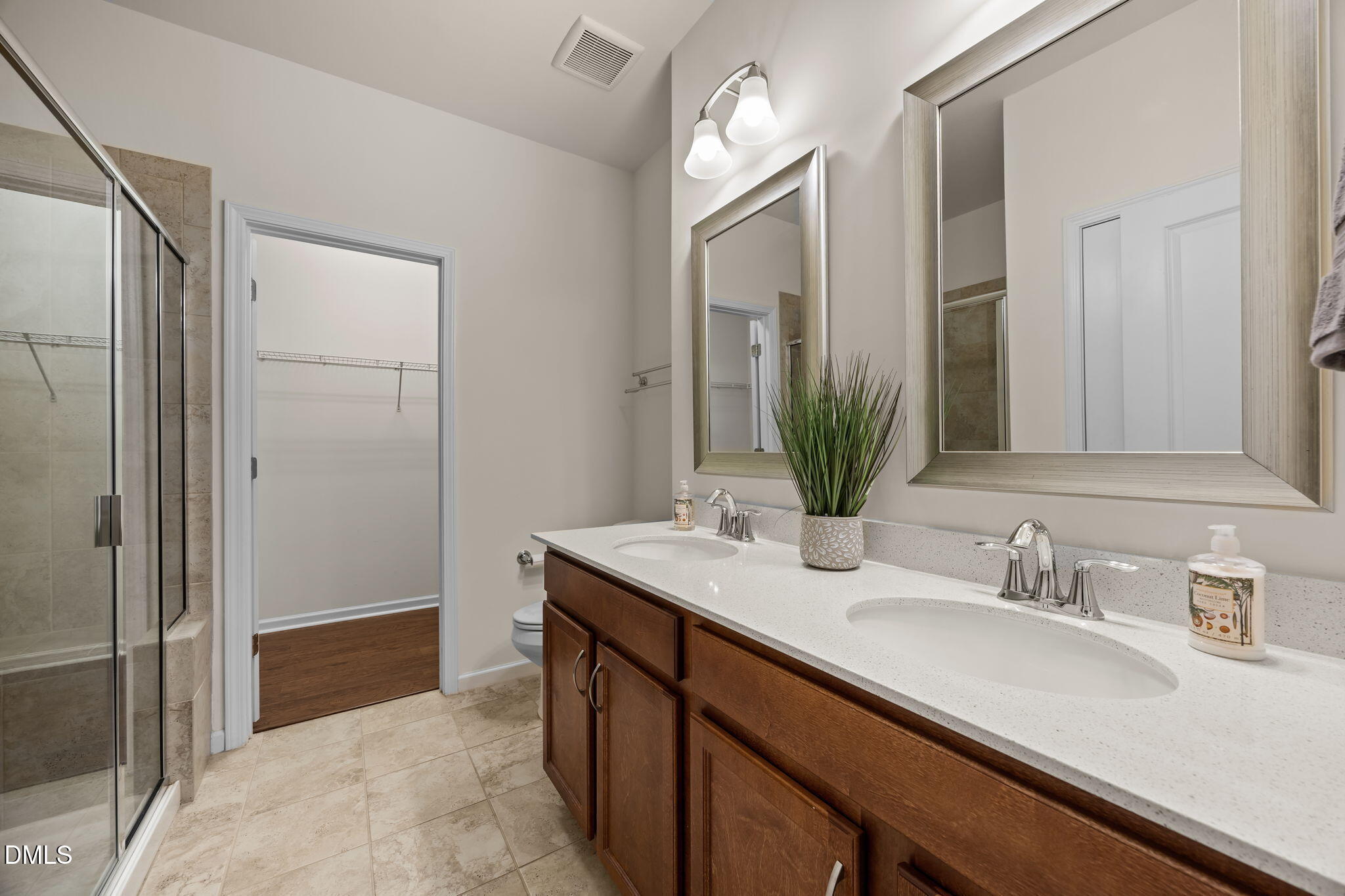 1001 Epiphany Road Morrisville, NC 27560 - Photo 14 of 39 a bathroom with a sink and a mirror