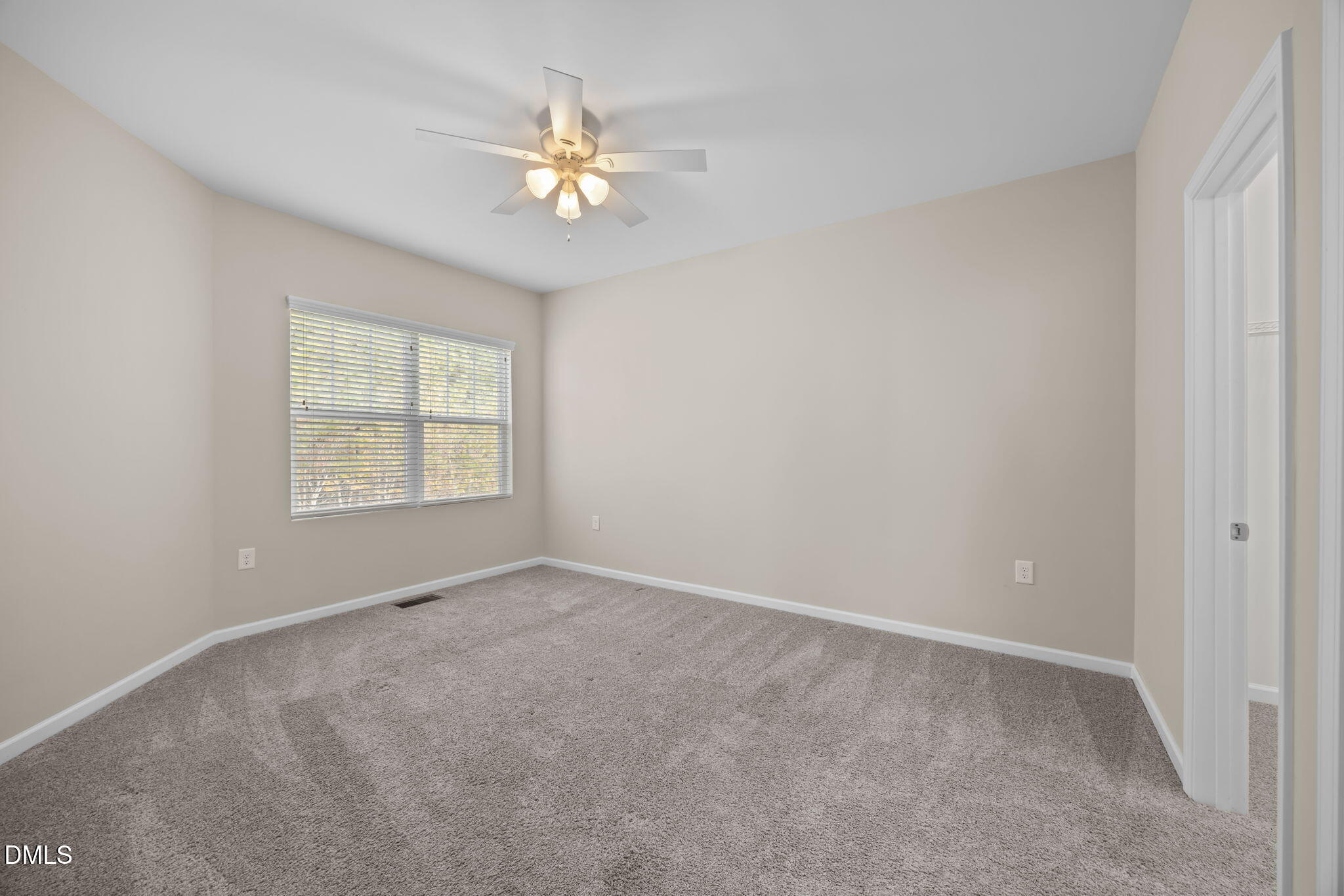 1001 Epiphany Road Morrisville, NC 27560 - Photo 20 of 39 a view of an empty room with a window