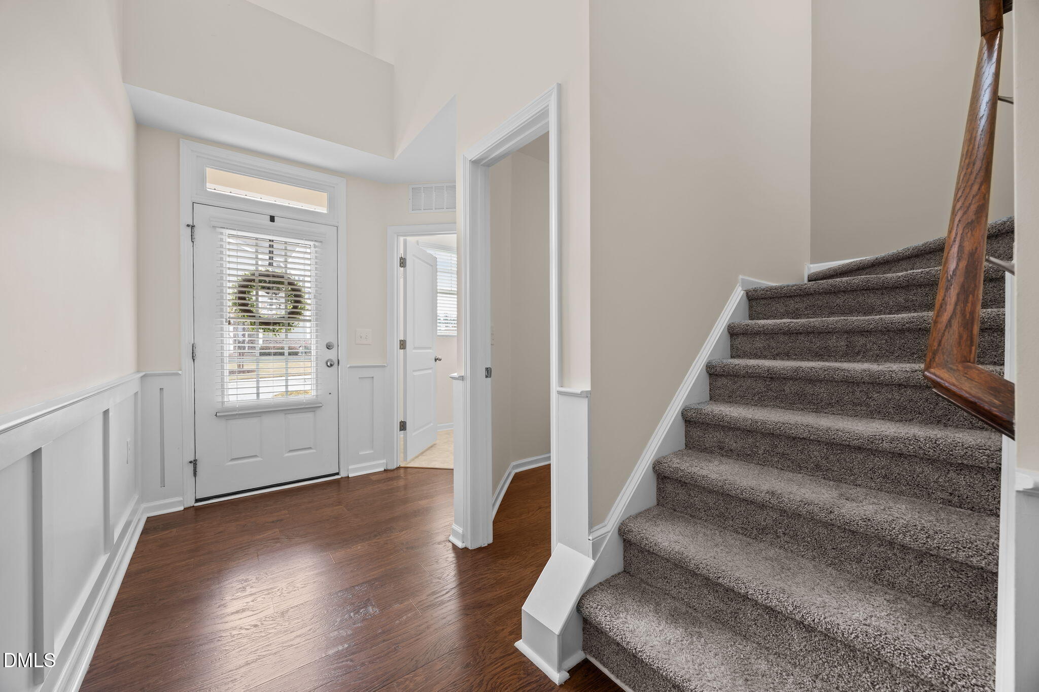 1001 Epiphany Road Morrisville, NC 27560 - Photo 2 of 39 a view of entryway with wooden floor and stairs