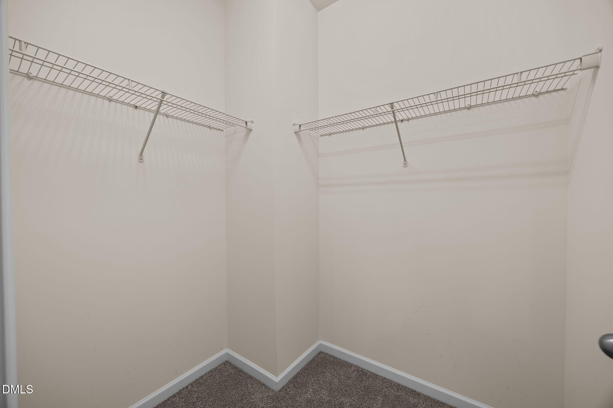 1001 Epiphany Road Morrisville, NC 27560 - Photo 22 of 39 a view of a room with racks on the wall