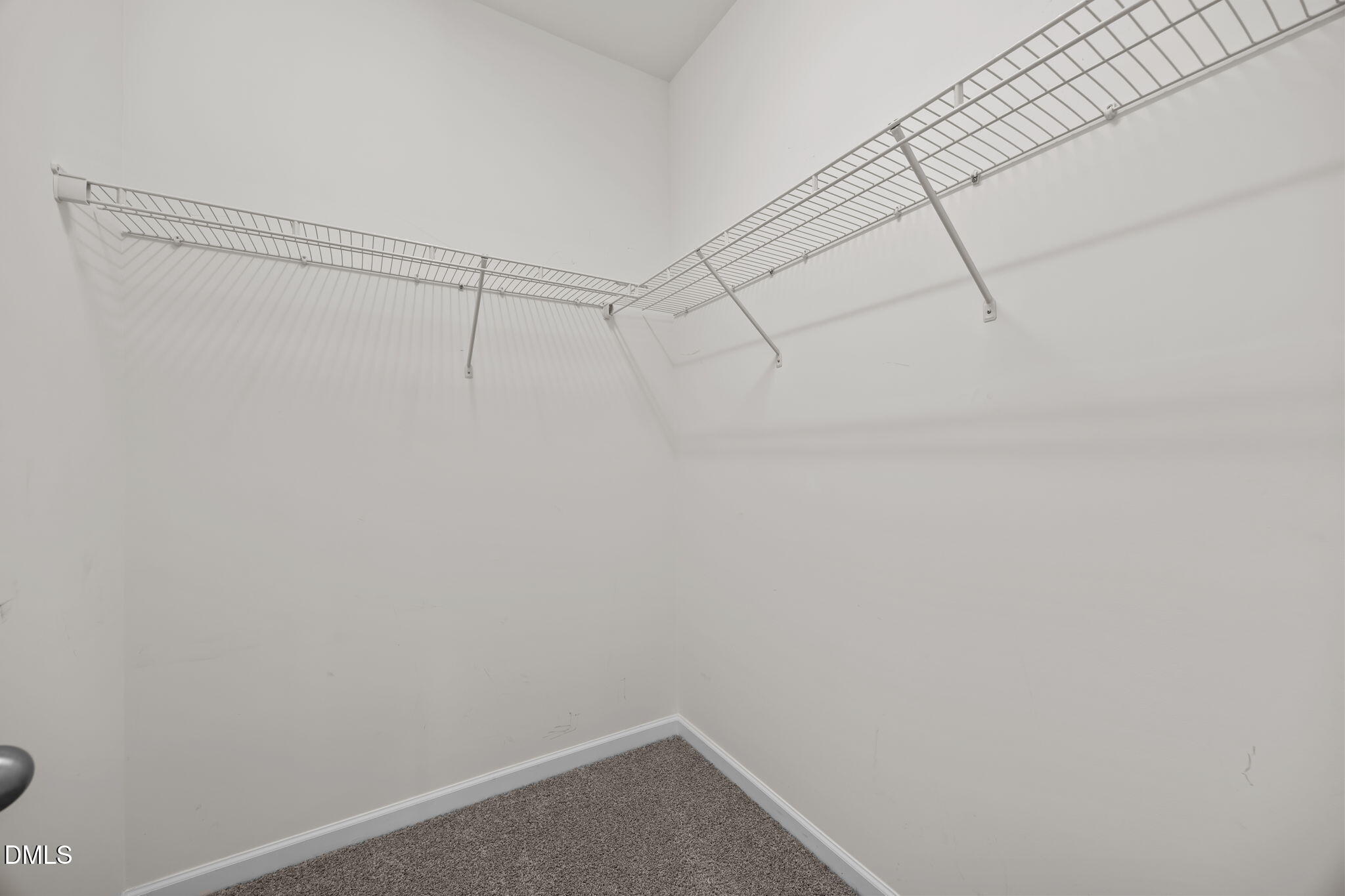 1001 Epiphany Road Morrisville, NC 27560 - Photo 24 of 39 a view of a room with racks on the wall